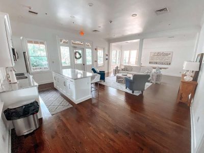 Spacious living room featuring modern furnishings, natural light, and stylish decor, showcasing expert home remodeling and remodeling services by Days Home Solutions. Bright open living room with white walls, hardwood floors, and cozy seating area, highlighting home renovation and interior design by Days Home Solutions.